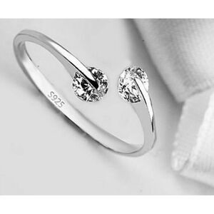 Floating Simulated Diamond Bypass Ring | Rhodium Sterling Silver